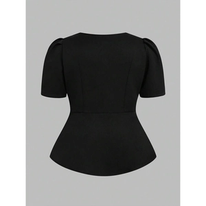 Detail view of black square neck peplum top showing fitted waist and puff sleeve texture