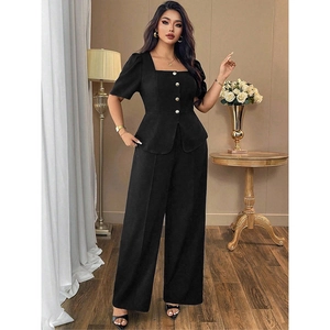 Detailed view of women's black square neck peplum top with elegant wide leg pants set