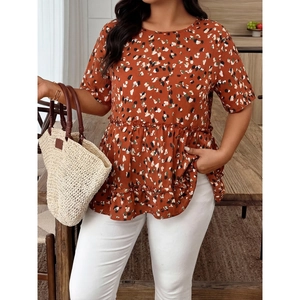Women's orange floral blouse featuring a round neck, short sleeves and peplum hem design