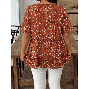 Women's orange floral blouse featuring ruffle hem and casual round neck back view
