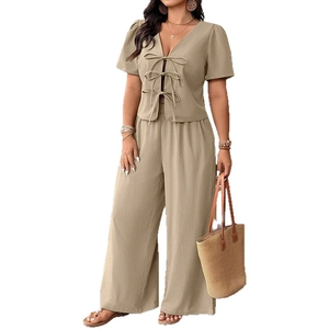 Women's khaki two-piece set featuring V-neck tie-front top and high-waist wide-leg pants