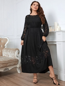 Detail of elegant black lace embroidery on long sleeves and hem of a satin dress