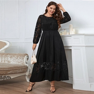 Detailed view of the intricate lace embroidery on the sleeves of this black maxi dress