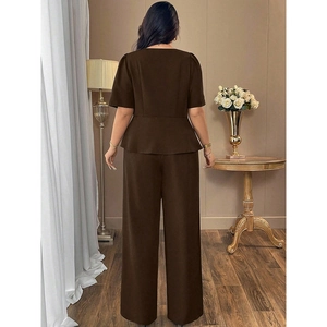 Detail of deep brown peplum top and wide leg trousers set from a back view