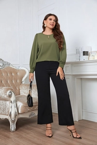 Detail of olive green crew neck shirt with cut-out neckline and elegant lantern sleeves