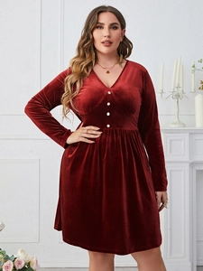 Elegant deep red velvet V-neck long sleeve dress with button detail and waist pleats
