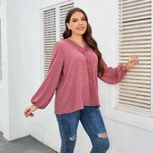 Elegant dusty pink V-neck chiffon blouse with lace trim and polka dot textured fabric