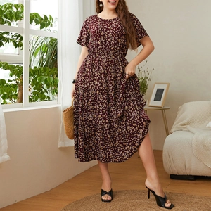 Short sleeve floral dress in dark red with waist tie and yellow flower pattern
