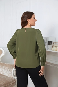Close-up of olive green blouse back detail with button closure and refined fabric texture