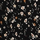Detailed close-up of the vintage floral pattern on black high-waisted dress fabric