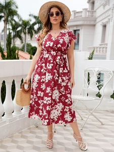 Detailed view of the V-neck and ruffled short sleeves on this red floral summer dress