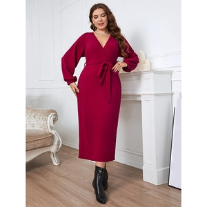Elegant wine red V-neck long sleeve maxi dress with waist tie in a minimalist room