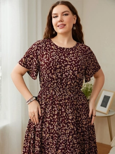 Detail view of red floral plus size dress with elastic waist and ruffled sleeves texture