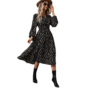 Bohemian black floral V-neck midi dress with long puff sleeves and smocked waist