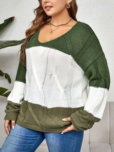 Close-up of tricolor block knit texture with cable pattern on casual winter sweater