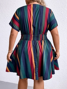 Detailed back view of a plus-size women's V-neck striped dress with an elastic high waist