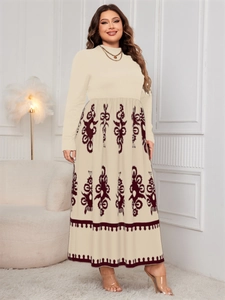 Detail view of high waist dress with ethnic red print skirt and cream long sleeve top