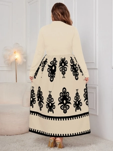 Detail of high-waisted dress with ethnic print pattern on the back of the skirt
