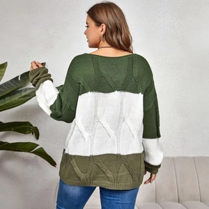 Women's color block cable knit sweater in olive and ivory with a cozy loose fit