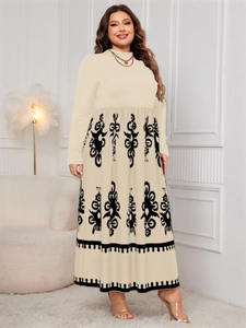 Detail of high waist dress with bohemian print hem and delicate wavy edge finish