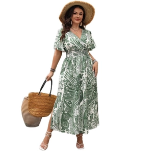 Summer bohemian maxi dress with green geometric print, V-neck, and ruffled sleeves