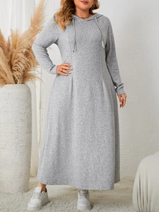 Detail of grey long sleeve hooded maxi dress featuring waist pleats and soft knit fabric
