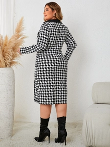 Detail of long sleeve houndstooth dress with contrast lapel and slim fit silhouette