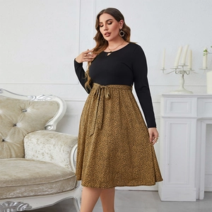 Plus size long sleeve leopard print patchwork dress with a belted waist and cutout neck