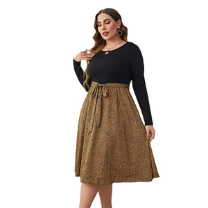 Women long sleeve dress with black top, leopard print A-line skirt and waist tie detail