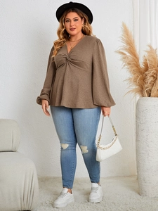 Detail of coffee brown V-neck top with stylish front twist knot for plus size fashion