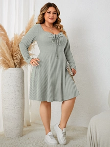 Sage green plus size long sleeve dress featuring V-neck drawstring and ribbed knit fabric
