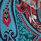 Macro view of paisley floral print fabric with vibrant blue and pink bohemian patterns