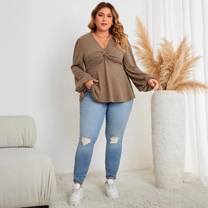 Women's plus size V-neck long sleeve top in brown textured fabric with front twist detail
