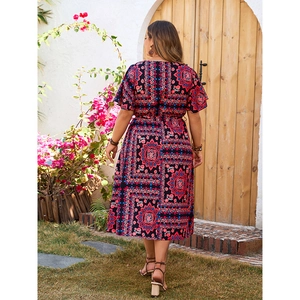 Bohemian oversized maxi dress with vibrant mandala print and comfortable V-neckline style