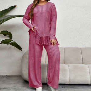 Women's deep pink knit lounge set with long sleeve tassel top and wide leg pants