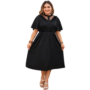 Elegant plus size black V-neck dress with lace mesh details and ruffle trim
