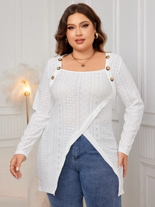 Macro detail of white eyelet embroidery cotton top with square neck and decorative buttons