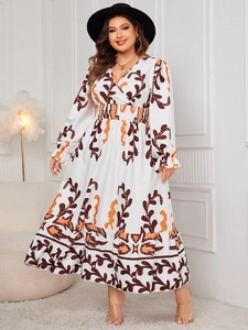 Detail of V-neck floral maxi dress with elastic waist and ruffled long sleeves