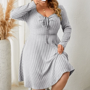 Women's grey V-neck ribbed knit long sleeve A-line mini dress with front tie detail