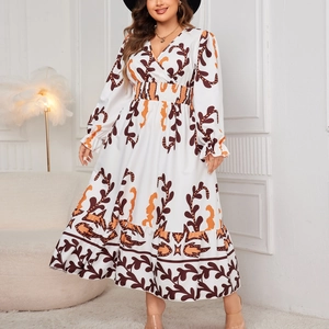 Bohemian V-neck maxi dress with long sleeves and brown abstract leaf patterns
