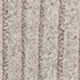 Close-up of the vertical stripe texture and neutral beige woven fabric of the V-neck shirt