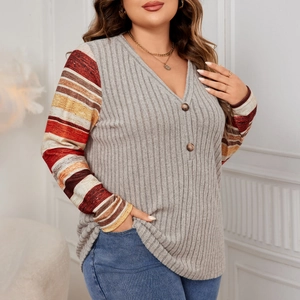 Plus size women's V-neck long sleeve top with colorful striped patchwork sleeves