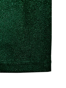 Detail of dark green knit evening dress showing metallic glitter texture and fine ribbing