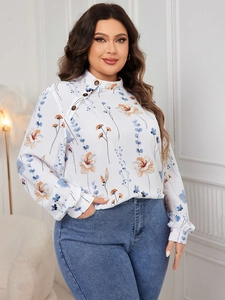 Detail view of floral print long sleeve blouse with side buttons and standing collar design