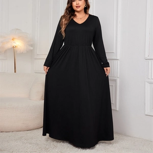 Plus size black long sleeve maxi dress with high waist and elegant V-neck silhouette