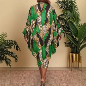 Oversized batwing sleeve dress with leopard baroque print seen from back view