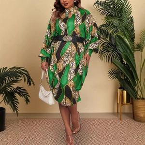 Elegant green batwing sleeve maxi dress with leopard print accents and black waist belt
