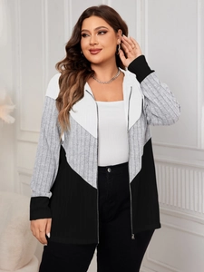 Detail of V-shaped striped knit cardigan with color-blocking and metal zipper close-up