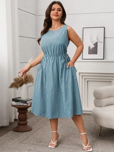 Detail of blue and white vertical striped sleeveless midi dress with functional pockets