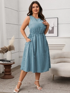 Detail showing the practical side pockets on a striped sleeveless midi dress